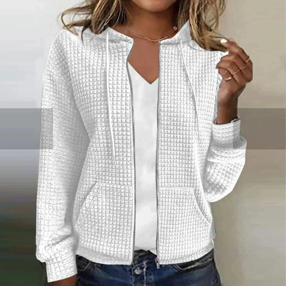 Sweat femme à capuche, zippé et confortable, pour un style décontracté et tendance. Mode casual féminine.