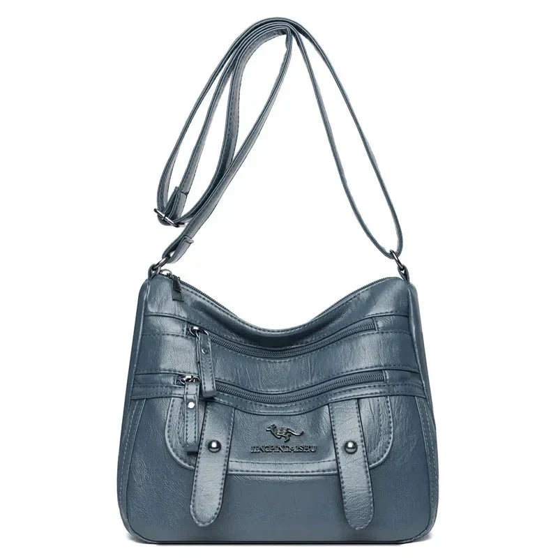 Sac à main femme bleu élégant en cuir souple, doté de compartiments bien organisés.