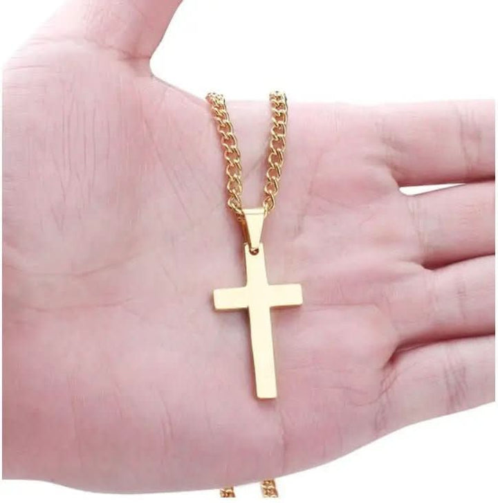 Accessoire élégant: collier homme noir avec pendentif croix argenté, parfait pour un look sophistiqué.