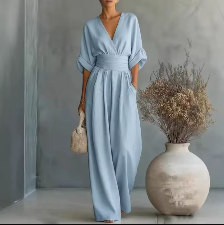 Tenue élégante et confortable: combinaison femme à taille haute, manches 3/4, idéale pour travail ou loisirs.
