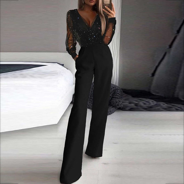 Combinaison femme chic noire à jambes larges, manches longues, parfaite pour soirée élégante.