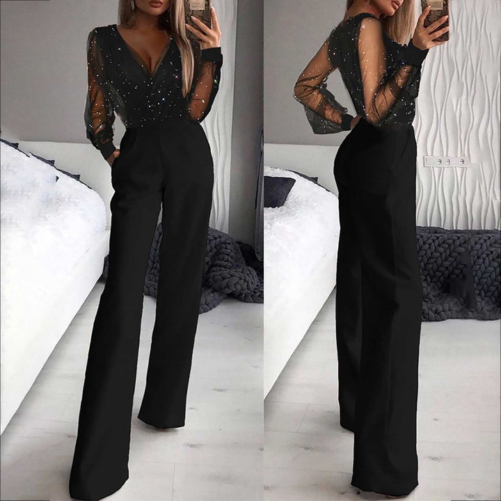 Combinaison femme noire polyvalente, jambes larges, manches longues, alliant confort et style casual chic.