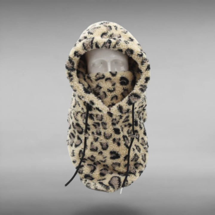 Balaclava thermique pliée, prête pour le ski, snowboard, offrant une chaleur essentielle pour l'hiver rigoureux.