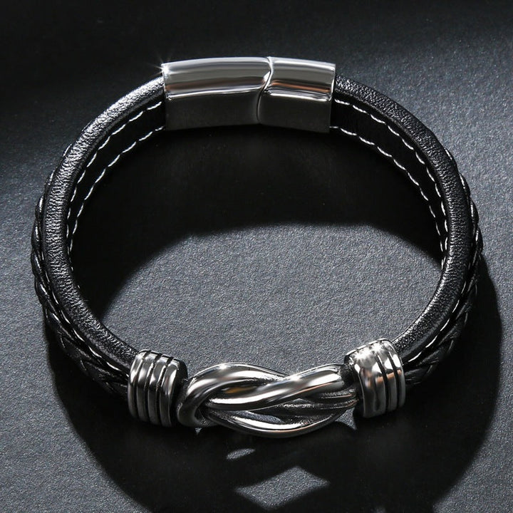 Bijou minimaliste: bracelet nœud infini, style unisexe, parfait pour un poignet élégant.
