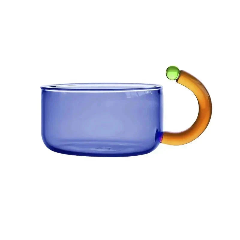 Set de tasses et bouilloire transparente en verre pour le thé, tisanes et infusions variées.