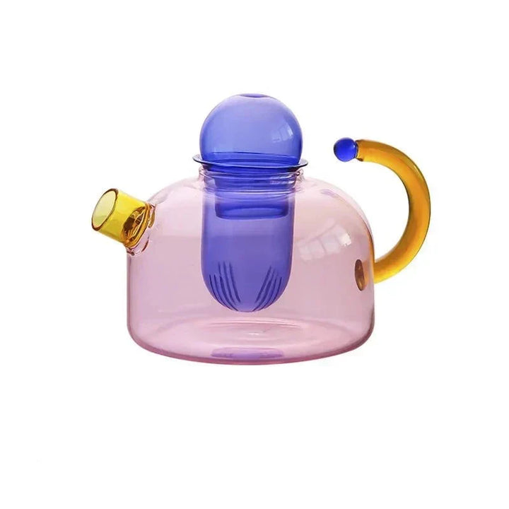 Bouilloire et tasses transparentes en verre, idéales pour admirer l'infusion de votre thé.