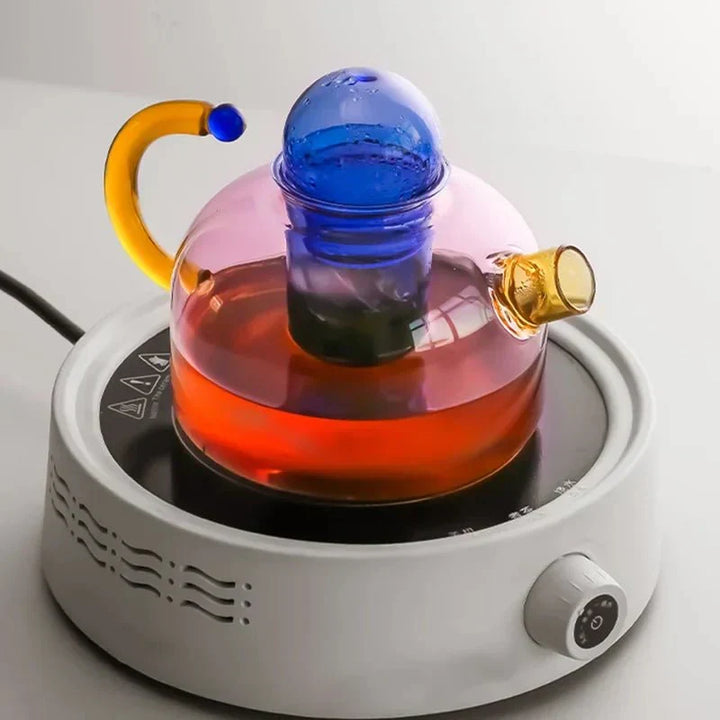 Bouilloire LuxeBrew en verre borosilicate transparent et tasses. Parfait pour thé et tisanes.
