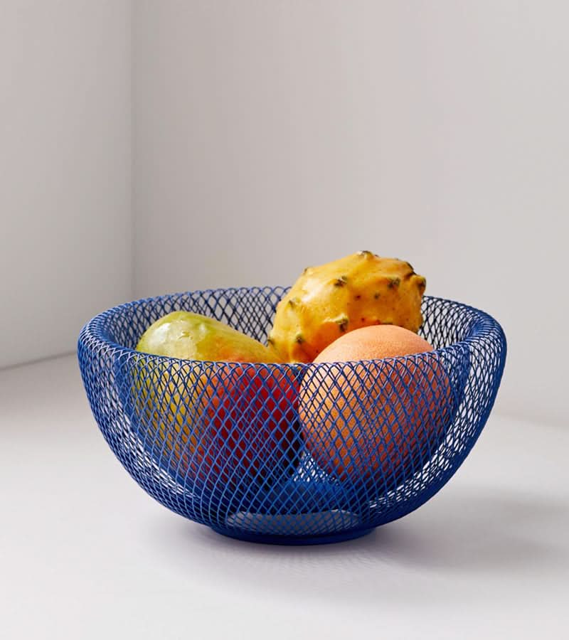 Corbeille à fruits ventilée en acier, design moderne, pour conserver vos produits frais plus longtemps.