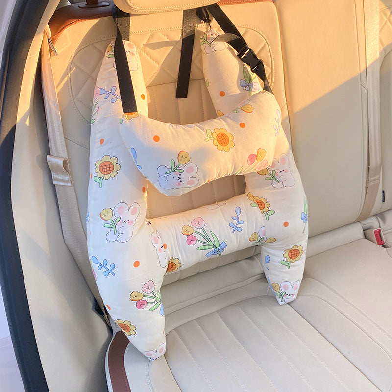 Coussin de voyage enfant ultra-doux en tissu respirant, soutien ergonomique pour un confort optimal du cou.