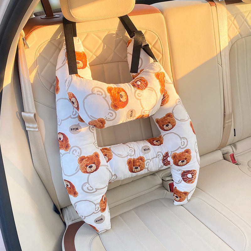 Coussin de cou de voyage pour enfant, design ergonomique assurant soutien et repos confortable durant les trajets.