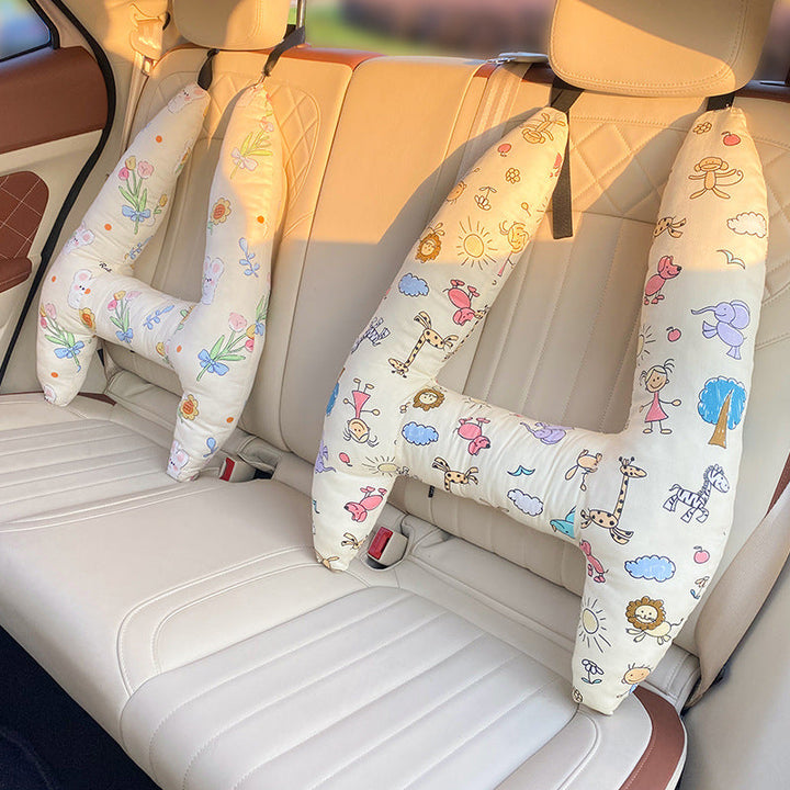 Coussin de voyage pour enfant avec design adapté, procurant un soutien ergonomique et un repos agréable.