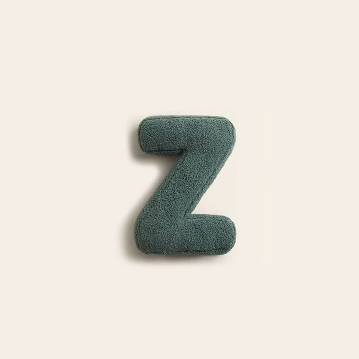 Coussin initiale Z en coton doux, touche décorative unique pour canapé ou lit.