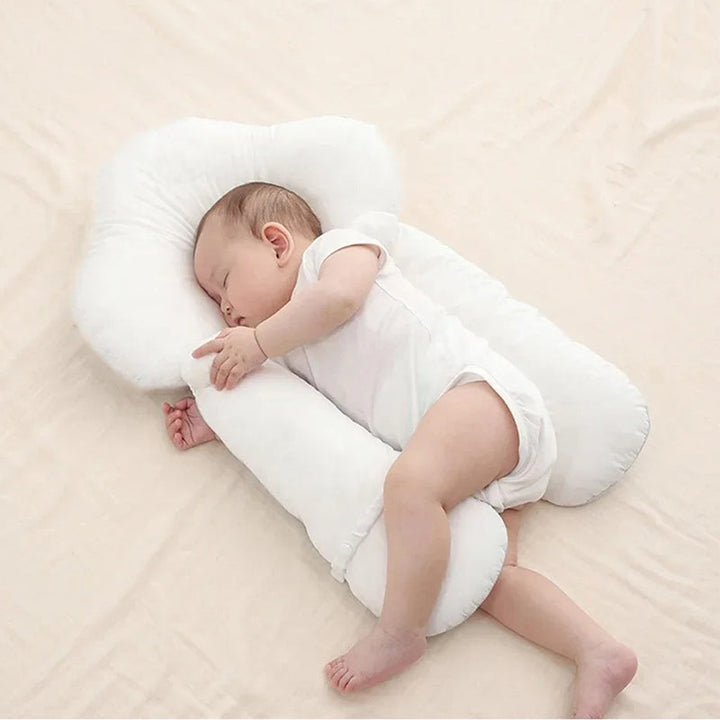 Coussin de sommeil bébé sûr, ergonomique, aide à la prévention du reflux et assure un bon maintien postural.