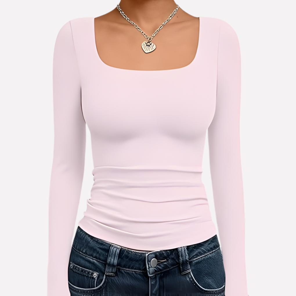 Élégant crop top femme noir, manches longues, encolure carrée. Tendance mode printemps/automne.