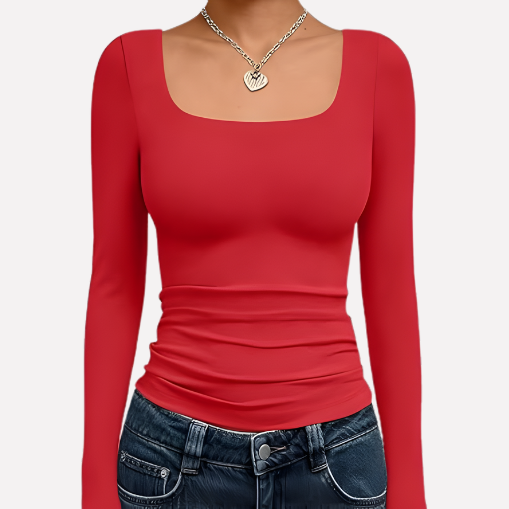 Mode femme : crop top noir à manches longues et encolure carrée. Un essentiel polyvalent.