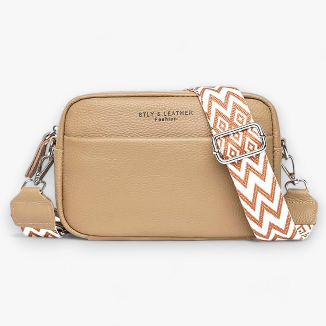 Sac bandoulière en cuir véritable pour femmes, design moderne, accessoire de mode essentiel.