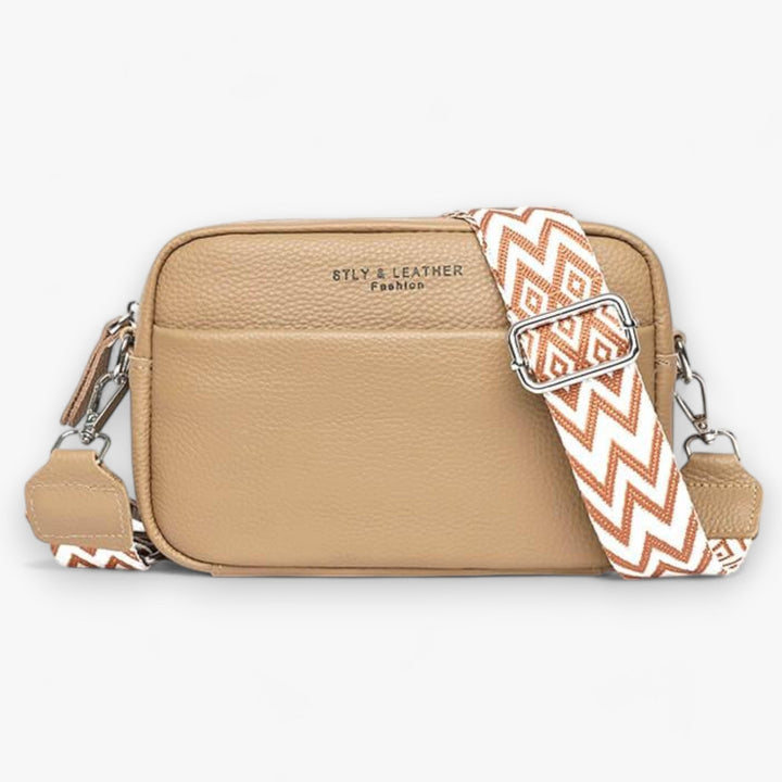 Sac bandoulière en cuir véritable pour femmes, design moderne, accessoire de mode essentiel.