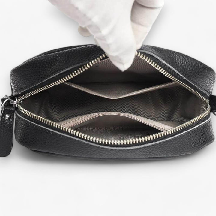 Sac de luxe en cuir pour femme, bandoulière ajustable, l'accessoire chic par excellence.