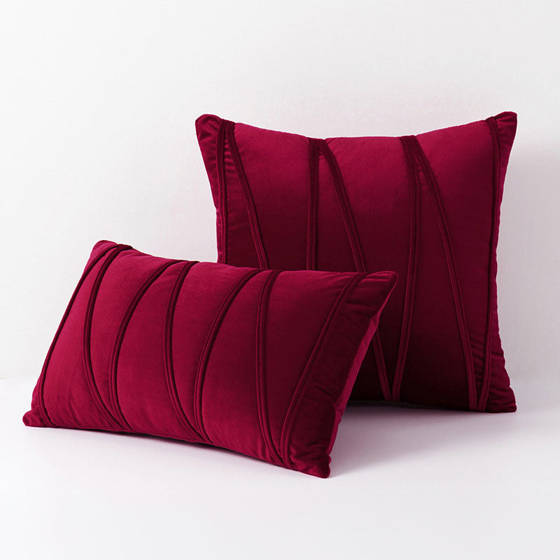 Housse de coussin décorative plissée en textile polyester. Parfaite pour moderniser un salon ou une chambre.