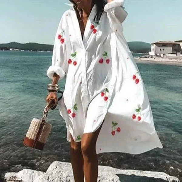Robe d'été femme, coupe fluide et style chemise. Confort et élégance pour une tenue décontractée et chic.