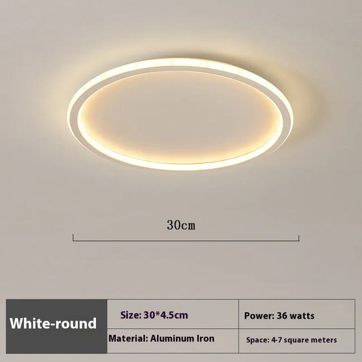Détail du bord du plafonnier LED rond, soulignant son design minimaliste et sa fabrication soignée.