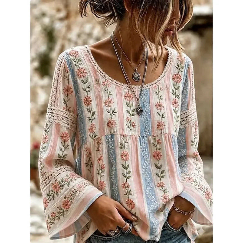 Blouse tunique femme coupe ample, style bohème, avec broderies florales. Vêtement confortable et élégant.
