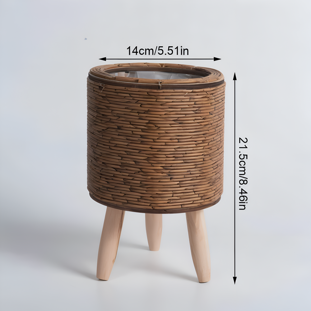 Pot de fleurs moderne en rotin synthétique avec pieds bois, idéal pour salon et terrasse.