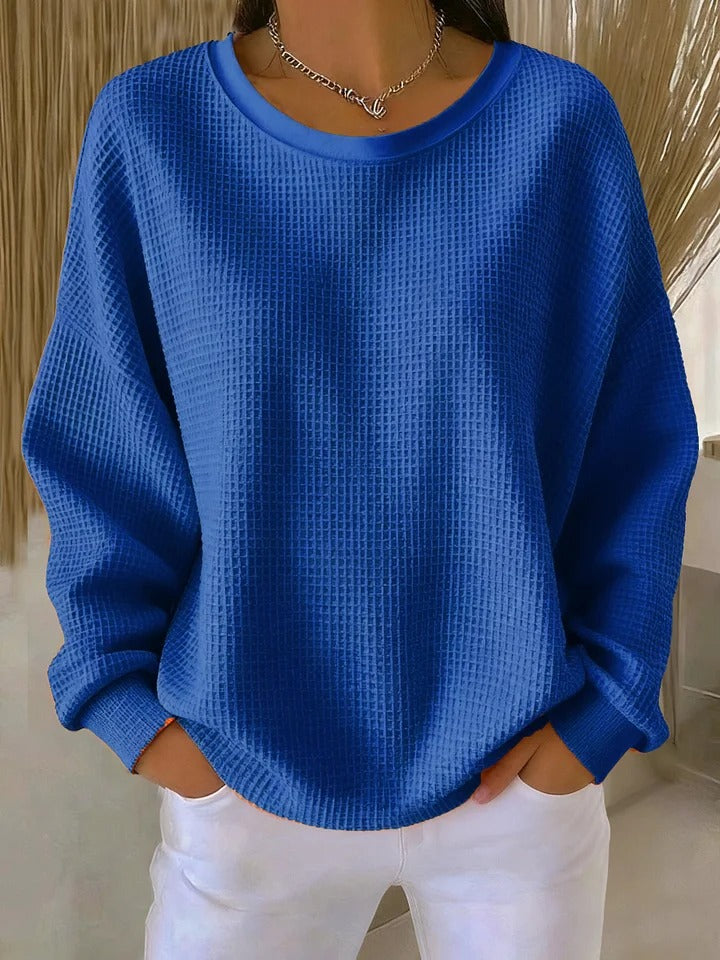 Blouse femme décontractée texturée, style moderne et chic, confort quotidien assuré.