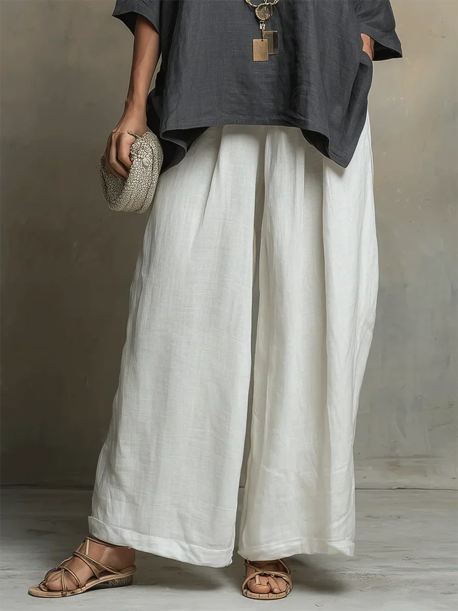 Confortable ensemble femme deux pièces avec pantalon fluide et haut ample. Parfait pour une allure décontractée d'été.