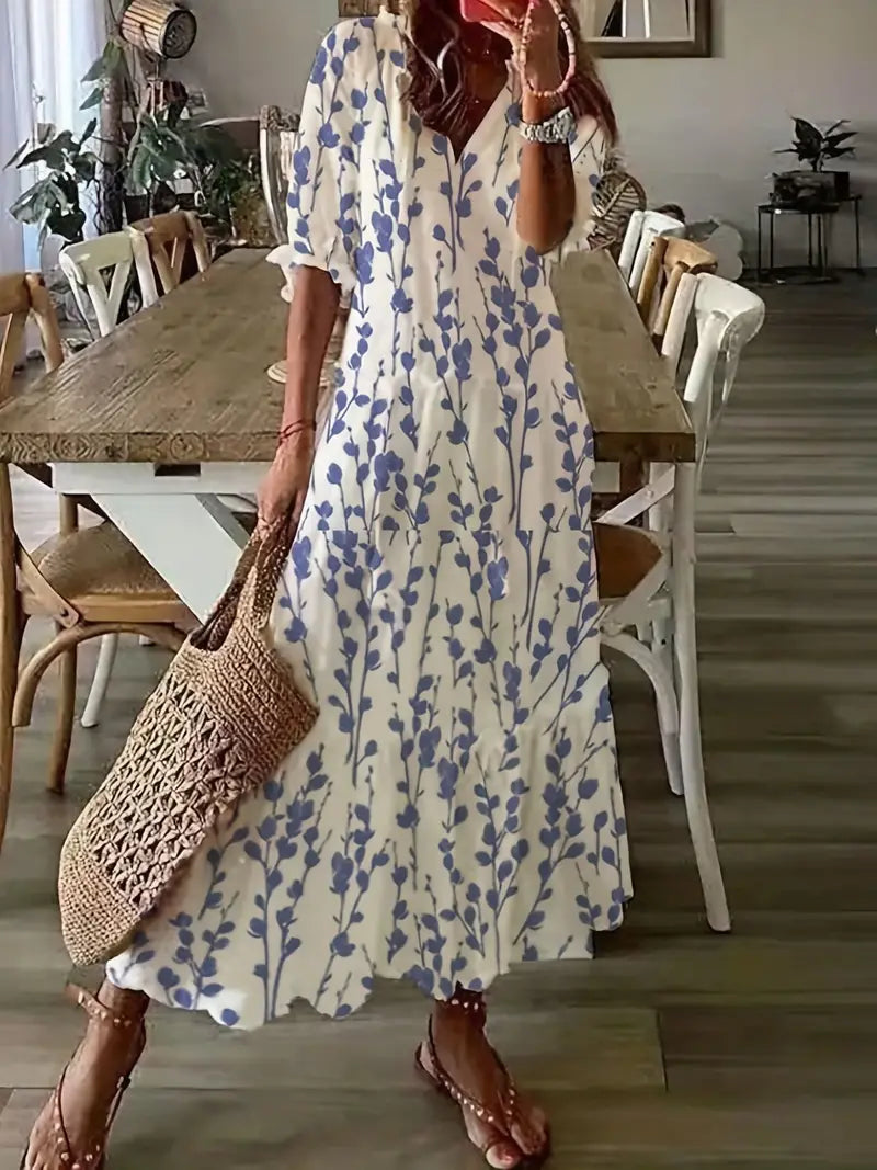 Robe bohème femme élégante, col V, volants et imprimé ikat, parfaite pour l'été et la plage.