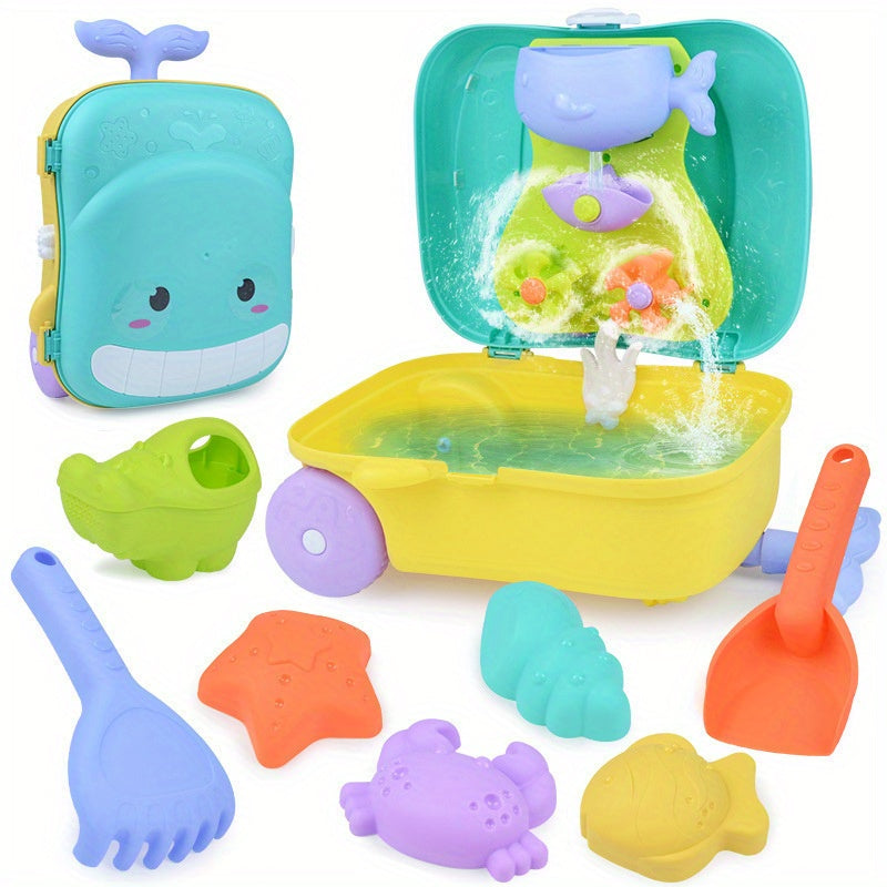 Jouets de plage colorés pour bébé : pelle, râteau, moules baleine et dinosaure.