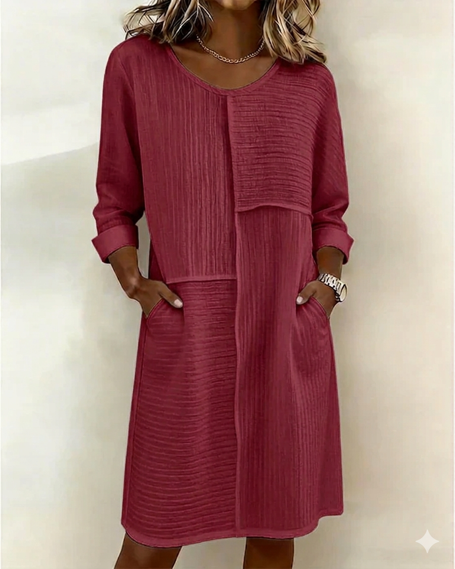 Robe fluide femme en coton lin texturé, col rond et manches 3/4. Look élégant et confortable pour toutes occasions.