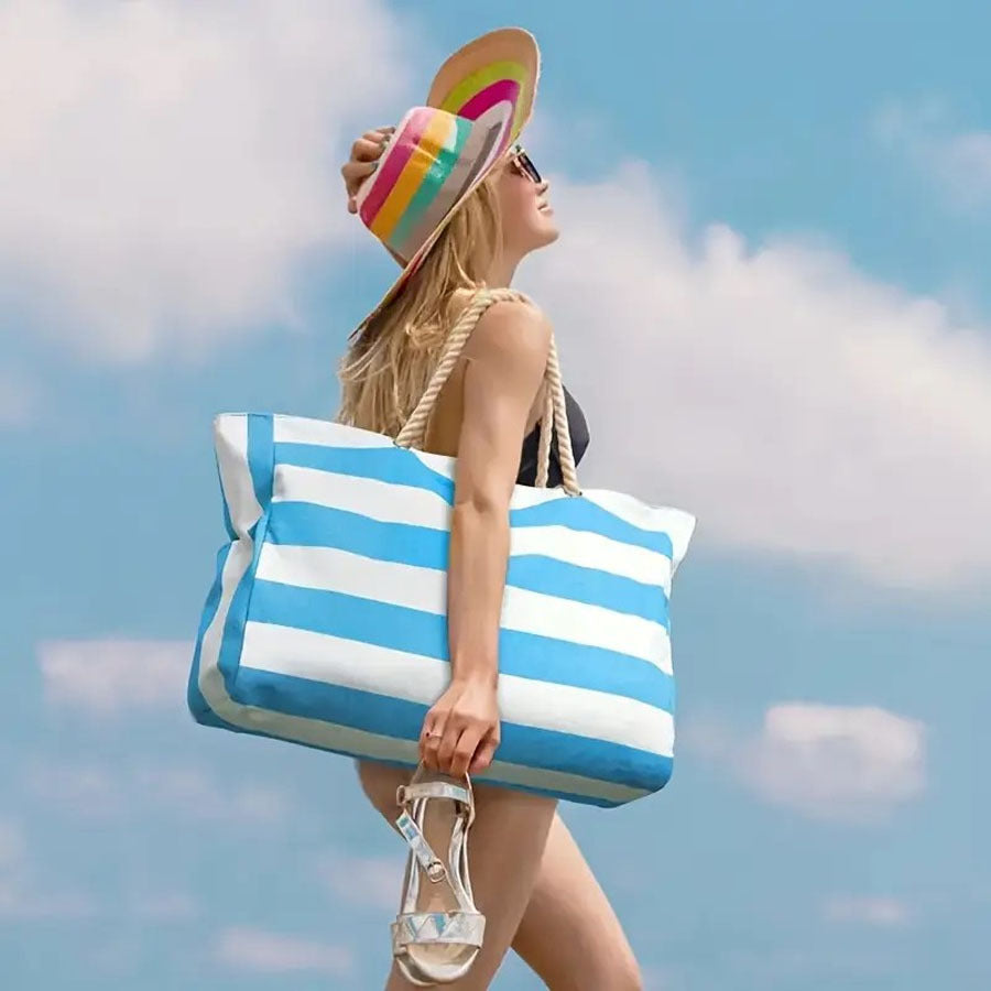 Sac de plage rayé femme, grand cabas chic pour l'été et les vacances.