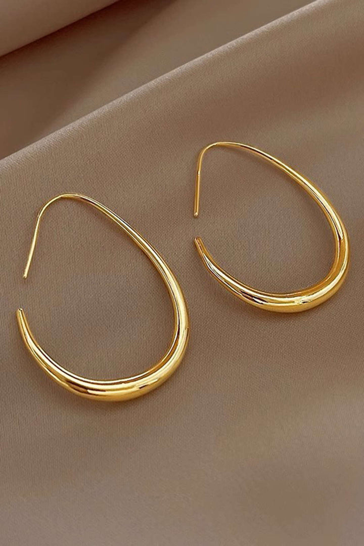 Bijou femme: boucles d'oreilles ovales élégantes, style intemporel, parfaites pour toute occasion.