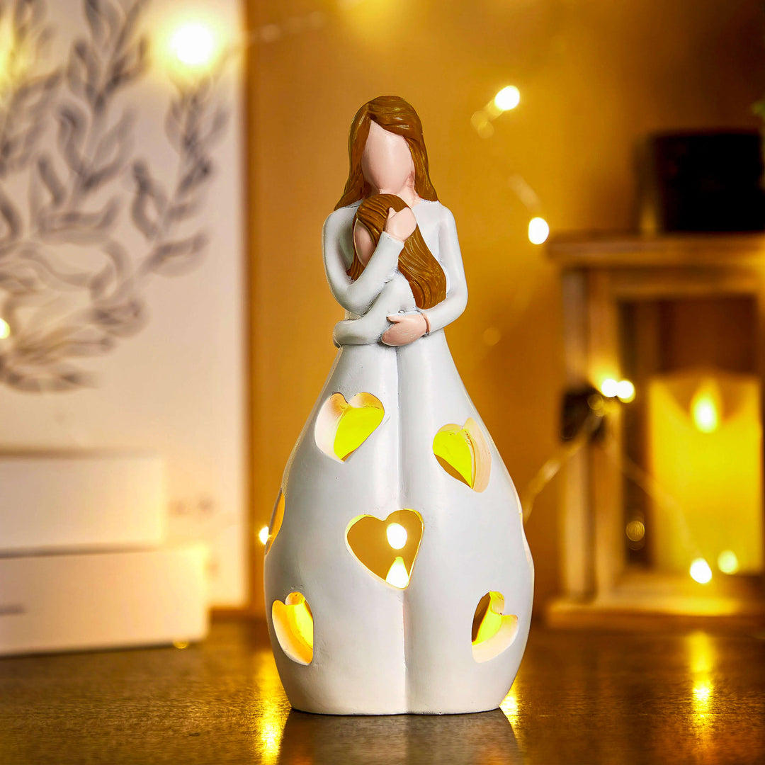 Lampe de table résine beige forme cœur, créant un éclairage intérieur doux et romantique.