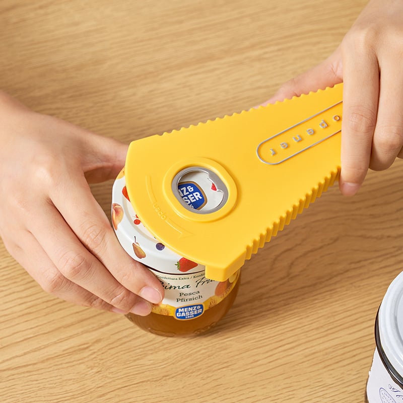 Polyvalent GripOpener, ouvre-bouteilles et boîtes jaune, essentiel pour une cuisine simple et accessible.