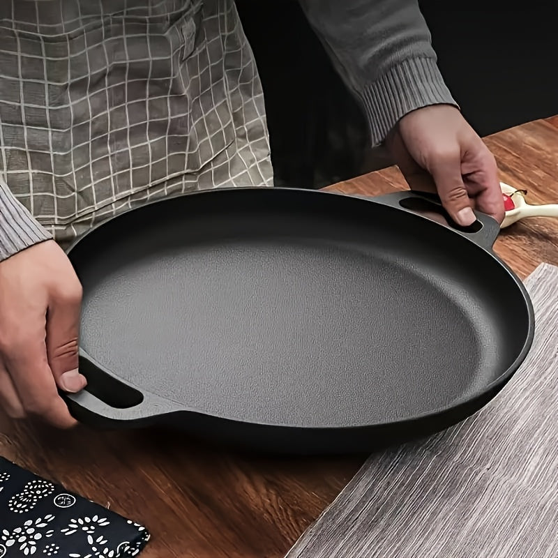 Poêle en fonte robuste pour cuisson uniforme, idéale pour grillade camping & cuisine extérieure.
