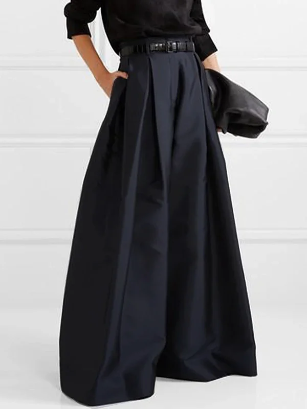 Pantalon plissé femme taille haute, coupe jambe large. Style moderne et fluide pour une allure élégante et confortable.