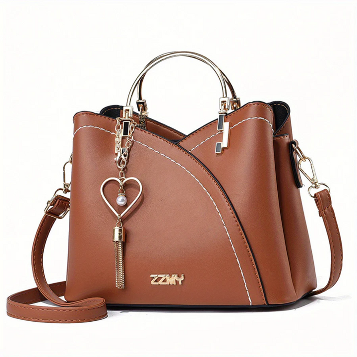 Sac à main polyvalent femme, avec poignées robustes, idéal pour transporter vos essentiels.