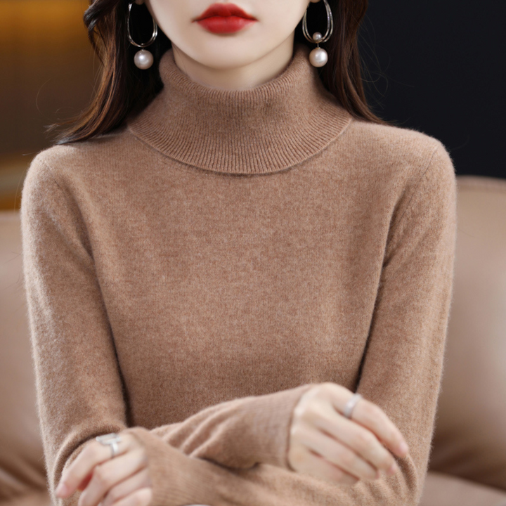 Pull col roulé femme, un basique chic et chaud pour compléter toute garde-robe hivernale élégante.