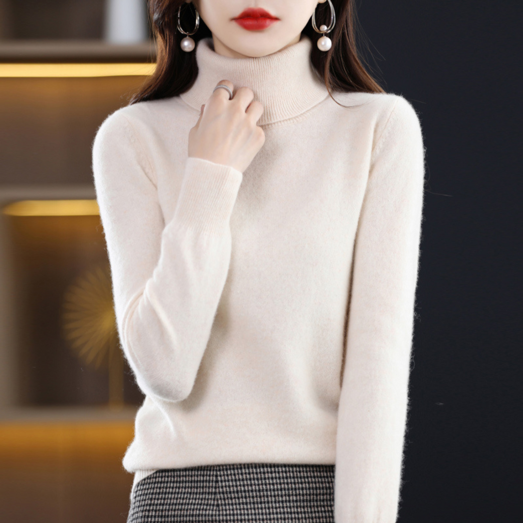 Pull col roulé femme à coupe élégante, chaud et doux, pour une silhouette hivernale chic et raffinée.