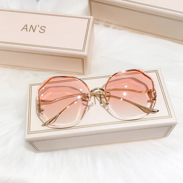 Lunettes de soleil dégradées haut de gamme, design luxe unisexe, protection UV indispensable pour l'été.