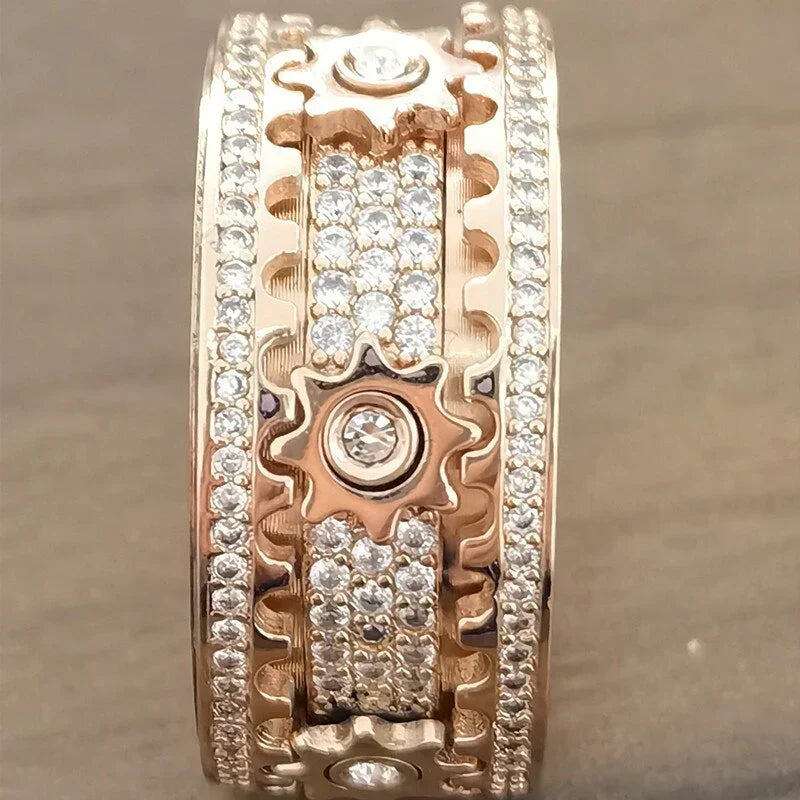 Bague élégante anti-stress femme, tournante. Option or rose, zircon. Parfaite pour détente.