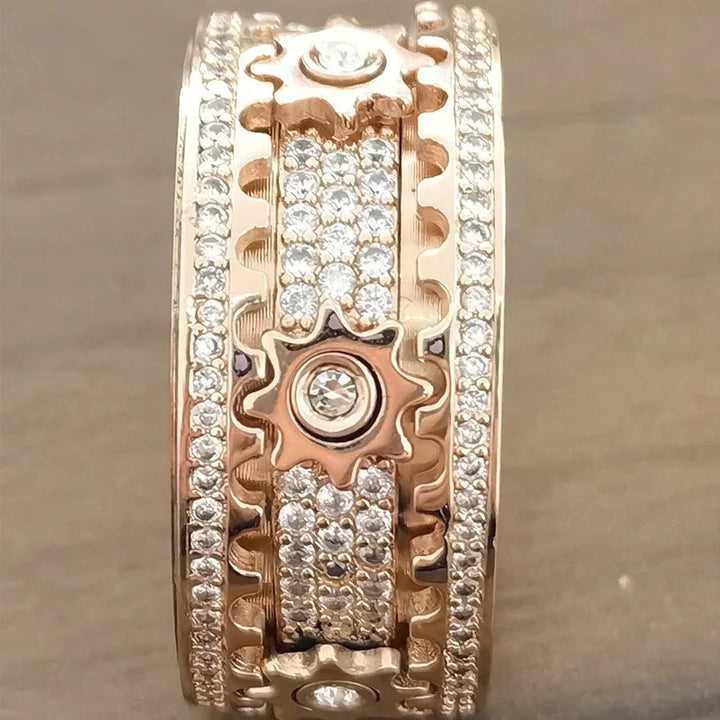 Bague élégante anti-stress femme, tournante. Option or rose, zircon. Parfaite pour détente.