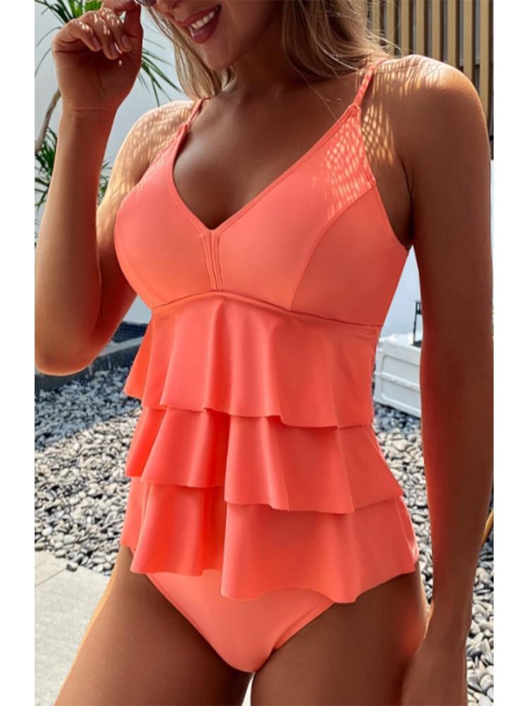 Maillot une pièce élégant femme, volants chics, col V. Parfait pour l'été et les vacances à la plage.