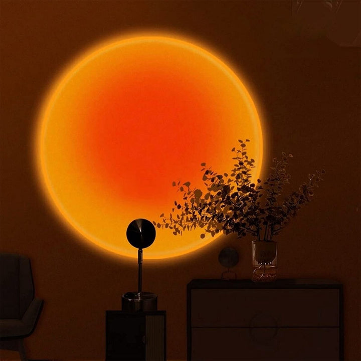Lampe LED de table créant une ambiance relaxante de coucher de soleil, idéale pour chambre ou salon.