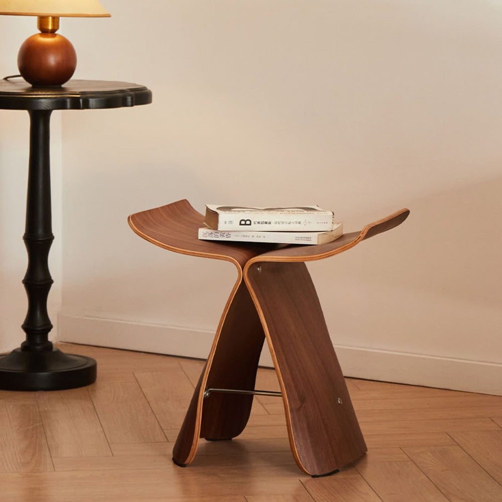 Tabouret design Papillon en bois noir, meuble d'appoint polyvalent pour entrée et bureau.