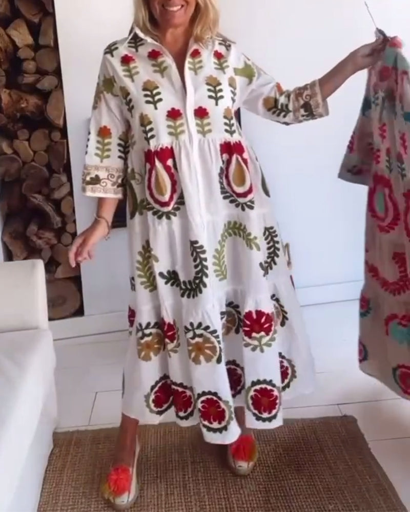 Robe florale midi fluide, idéale pour femme en été. Style décontracté, élégance printanière.