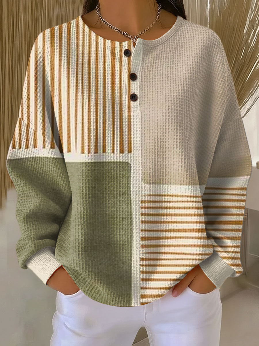 Pull femme chaud en tricot gaufré, style hivernal et confortable.
