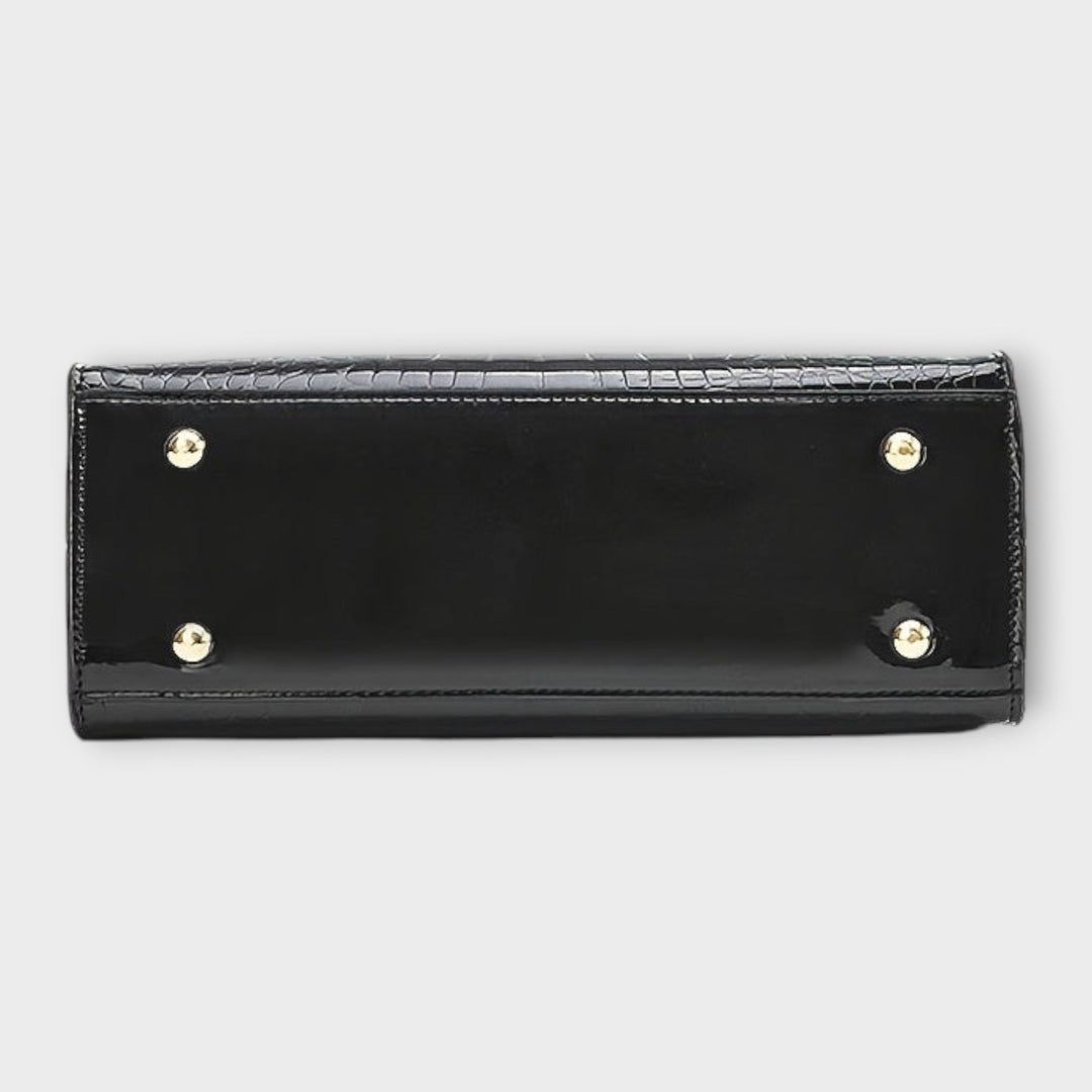 Sac à main femme motif crocodile brillant, design pratique et moderne pour un look sophistiqué au quotidien.